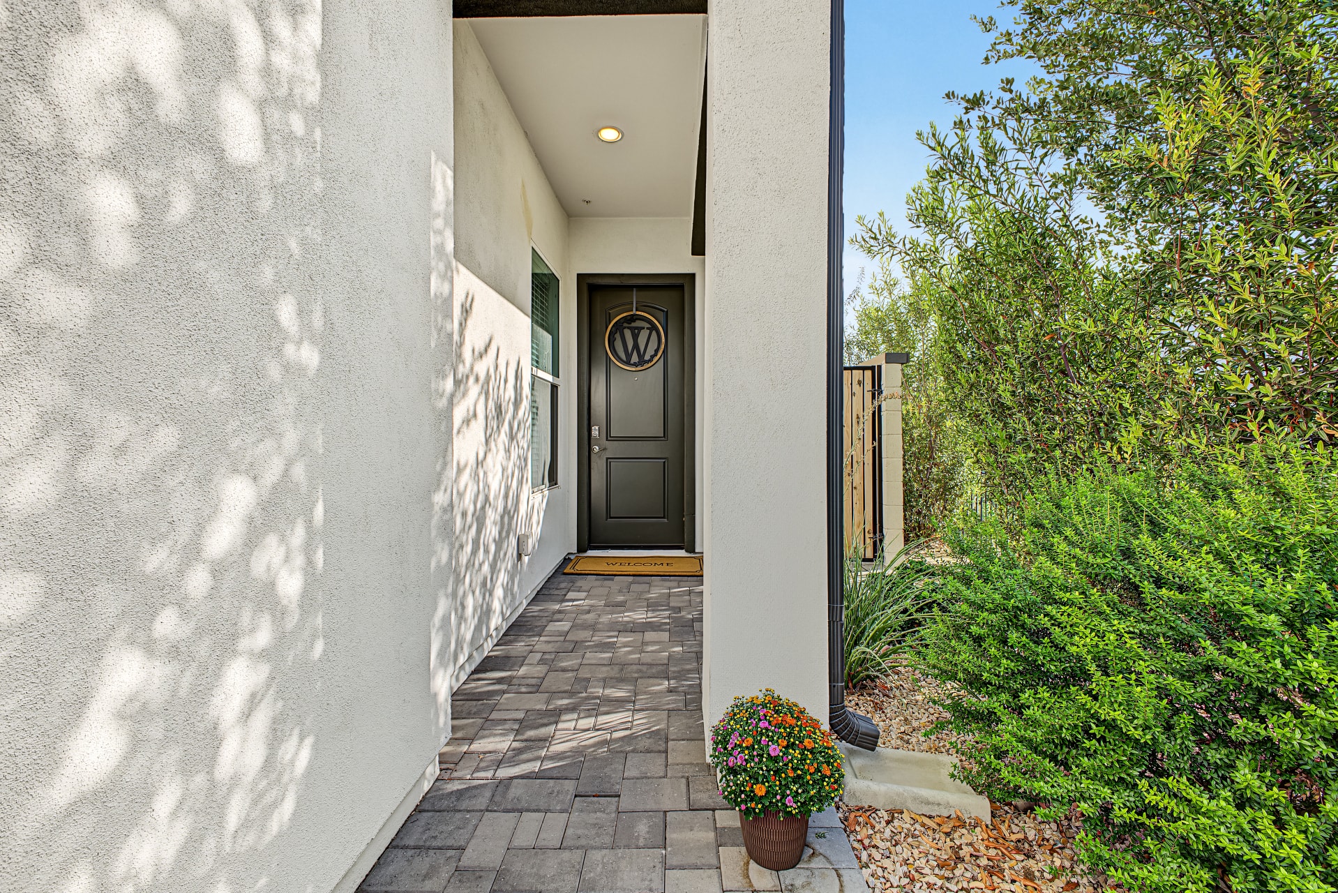 Exterior — paver walkway and front entry door