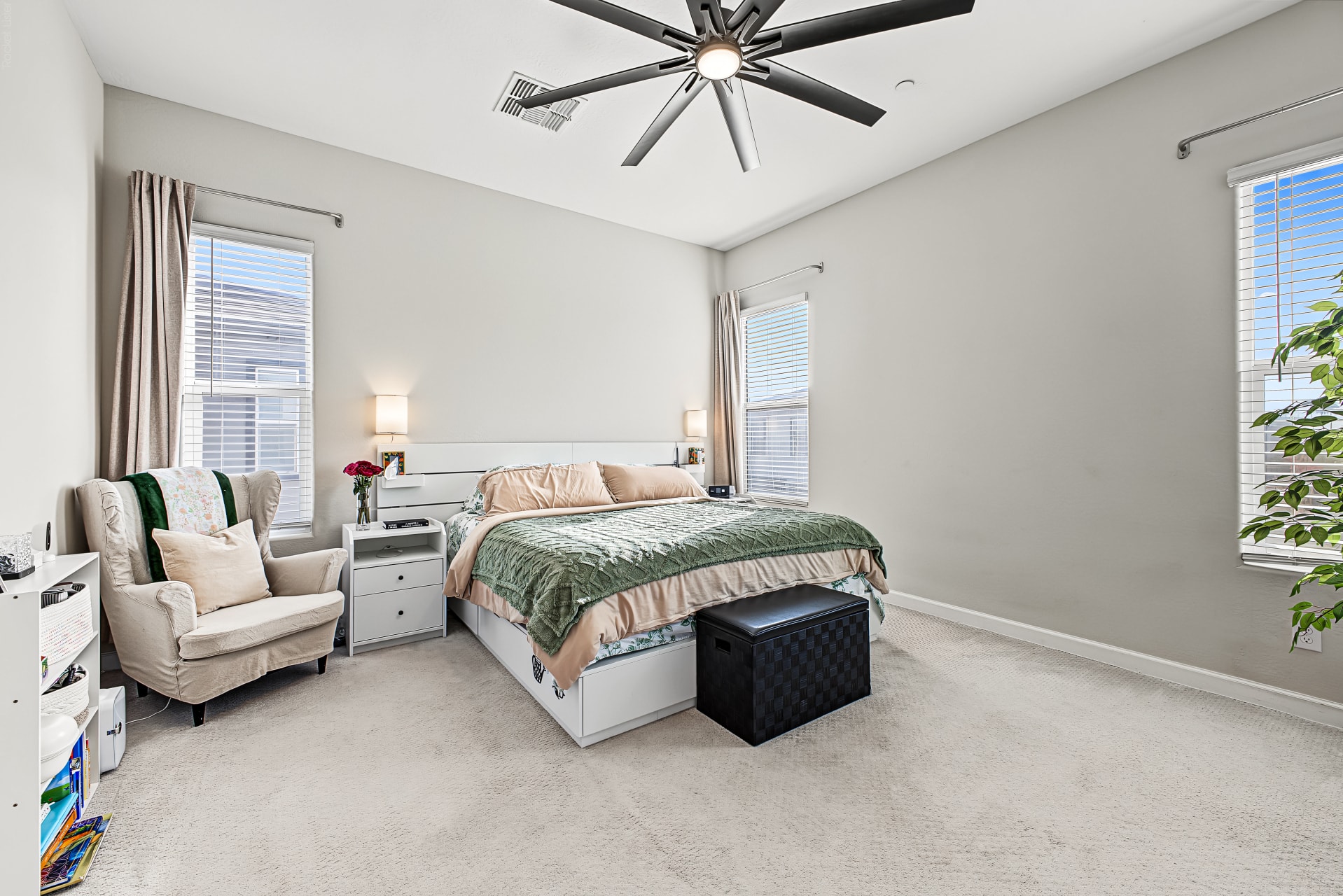 Interior — primary bedroom with ceiling fan