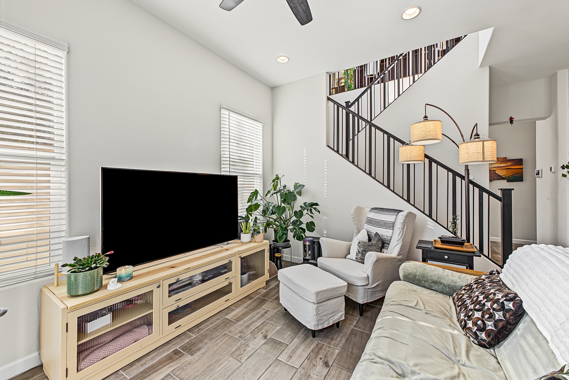 Interior — living room with TV and staircase