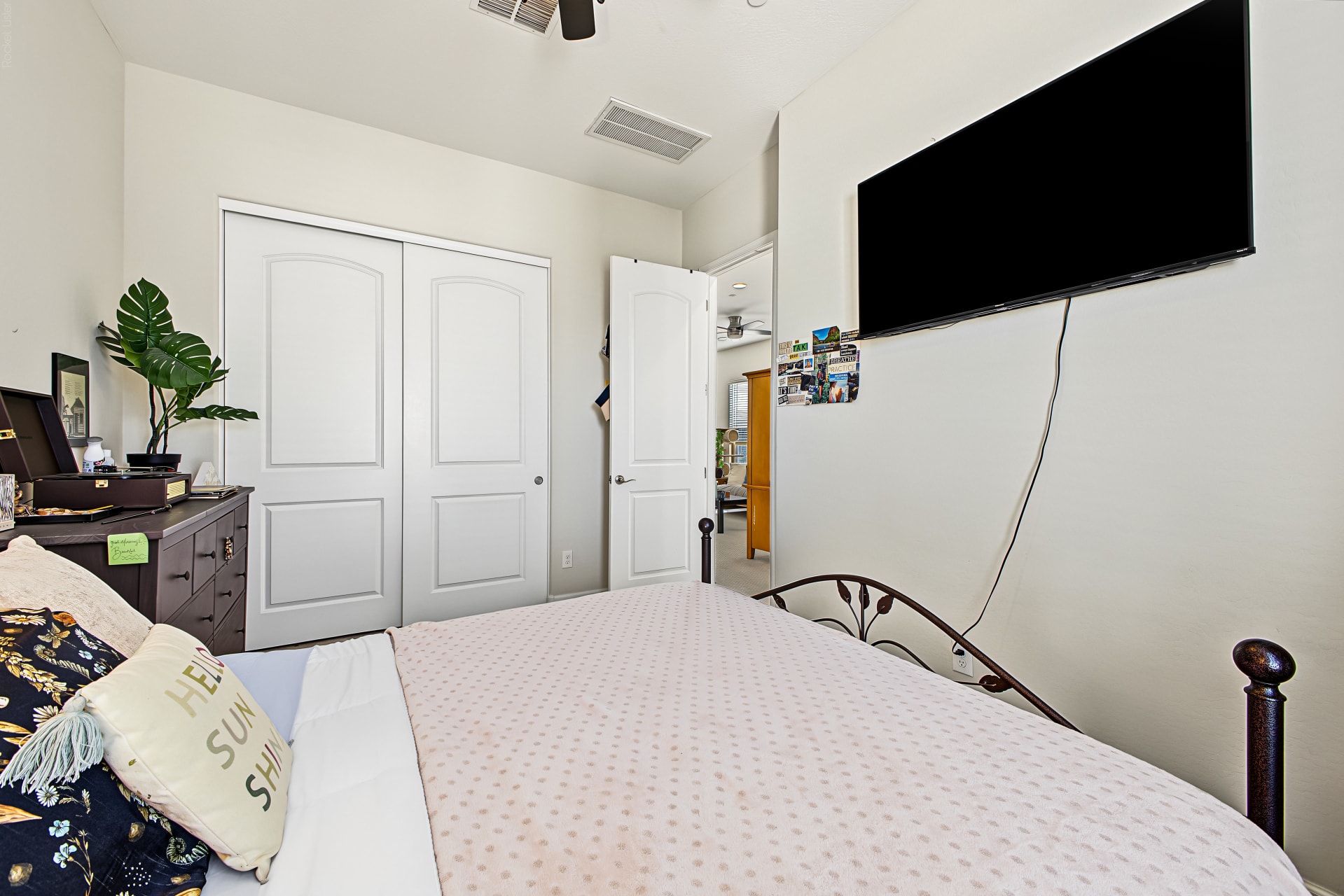 Interior — bedroom 3 with closet and TV mount