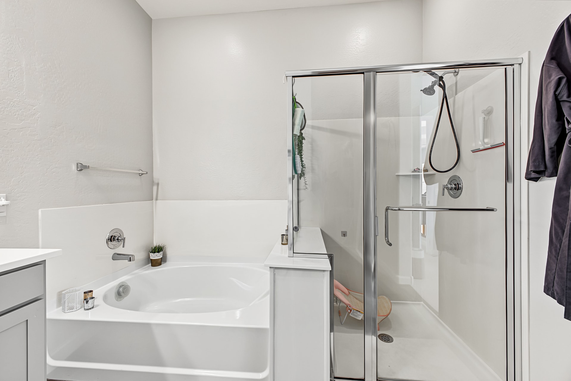 Interior — primary en-suite soaking tub and glass shower
